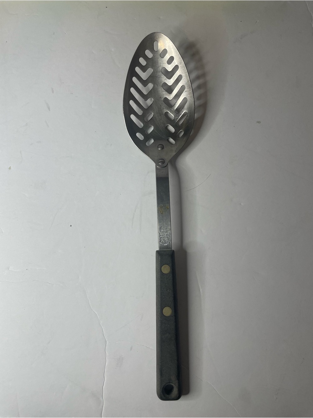 Vintage Ekco Stainless Steel Slotted Serving Spoon with Black Handle